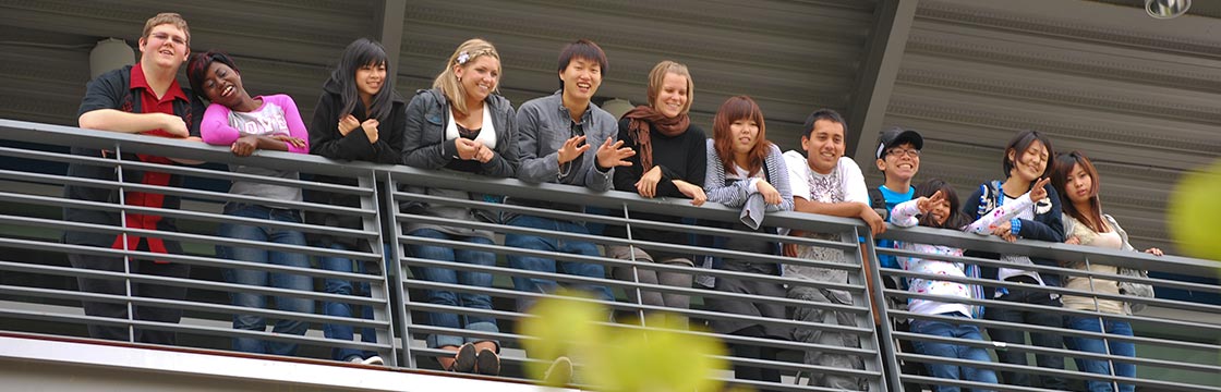 Group of Highline College students standing on balcony of the student union