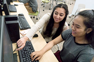 Highline College students using computers at the Writing Center